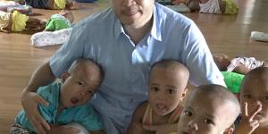 Mr. Peter with the babies from YGW