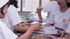 Donating umbrellas and books