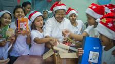 Children are happy with donated books