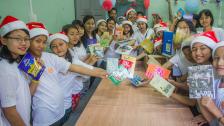 Children are happy with donated books