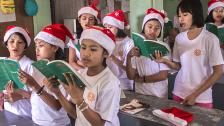 Children sing while