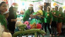 Giving stuffs to children for “one stuffed animal toy per orphaned child” program on Christmas