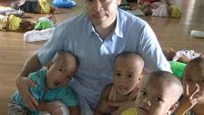 Mr. Peter with the babies from YGW